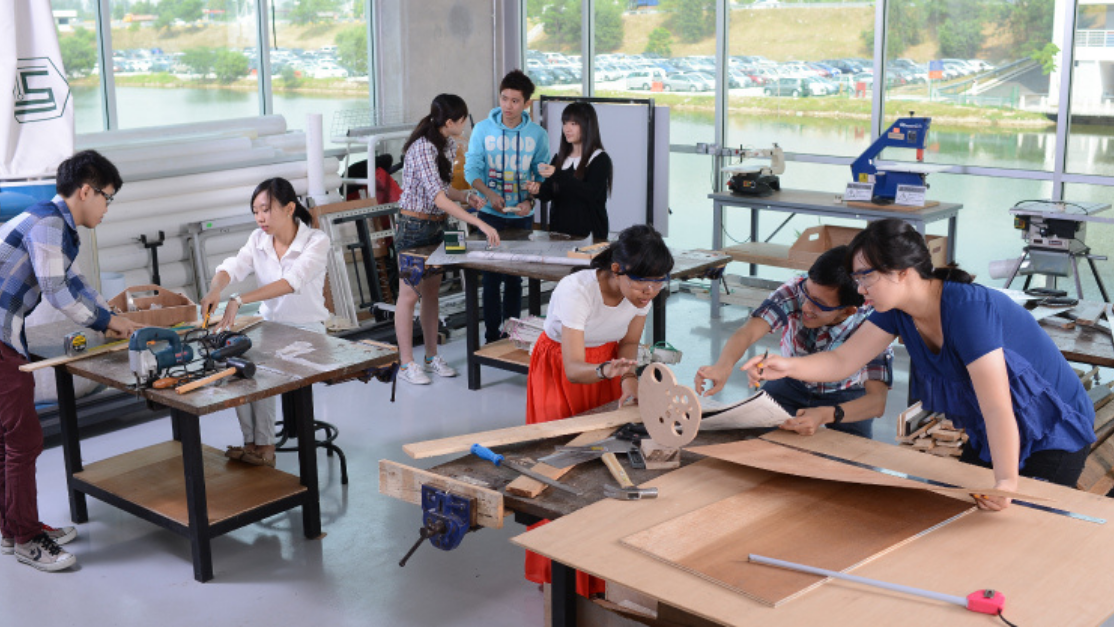 class ongoing inside a carpentry studio