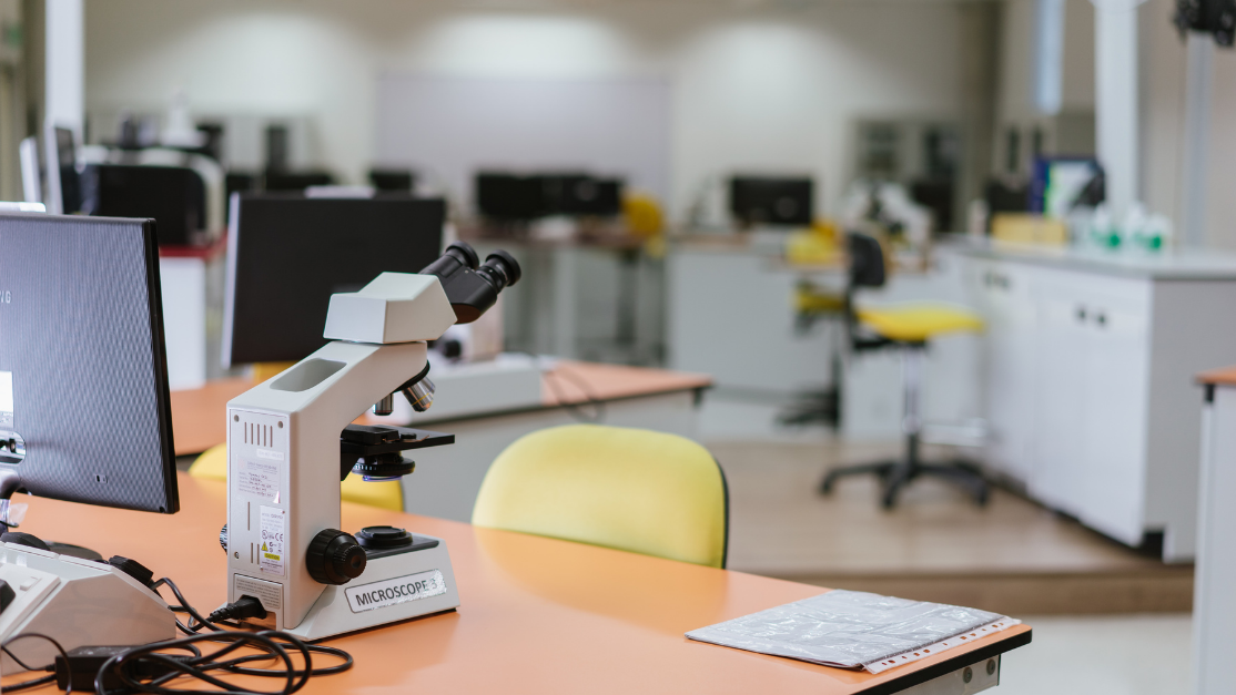 microscope placed in front of a monitor