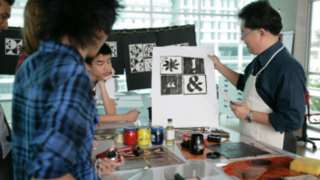 students working on a print