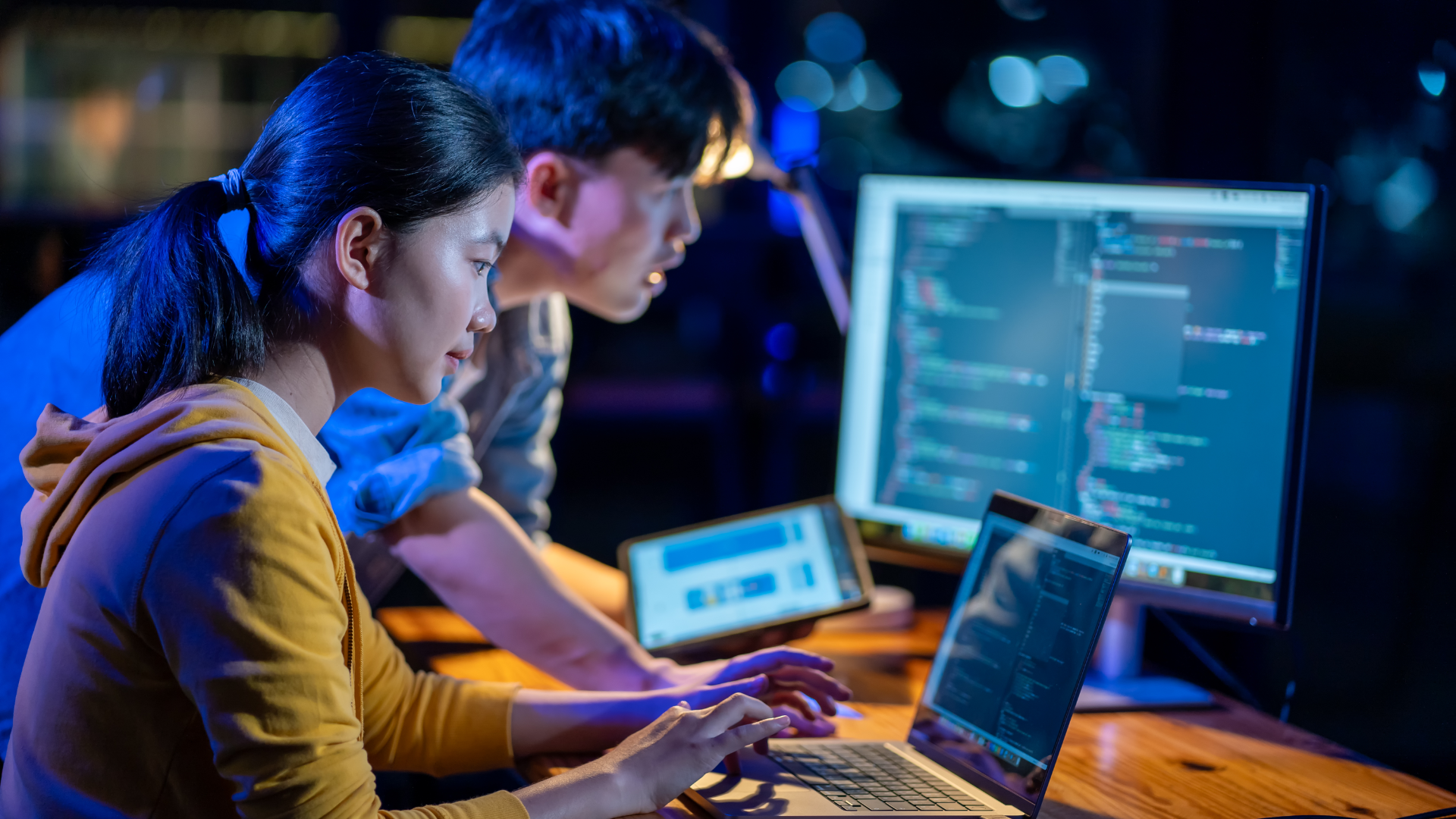Two people coding