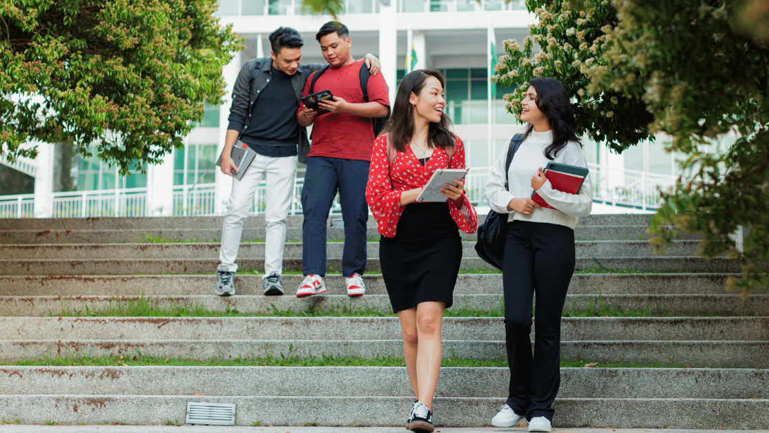 Students walking down the outdoor staircases