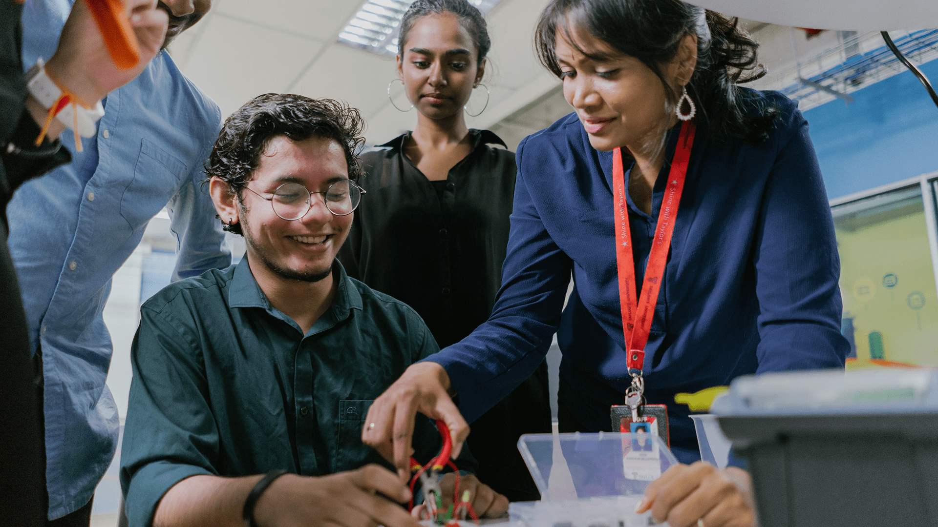 Taylor's student buidling a prototype in Taylor's Makerspace