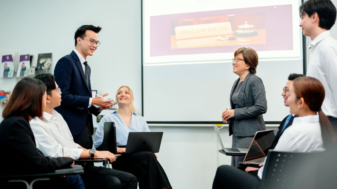 Taylor's hospitality lecturers and student having discussion