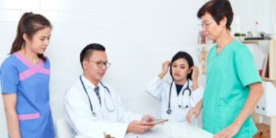 Doctor checking on the patient