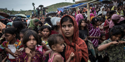 Group of refugees waiting for food