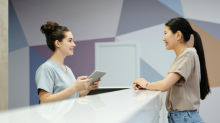 women in hotel reception