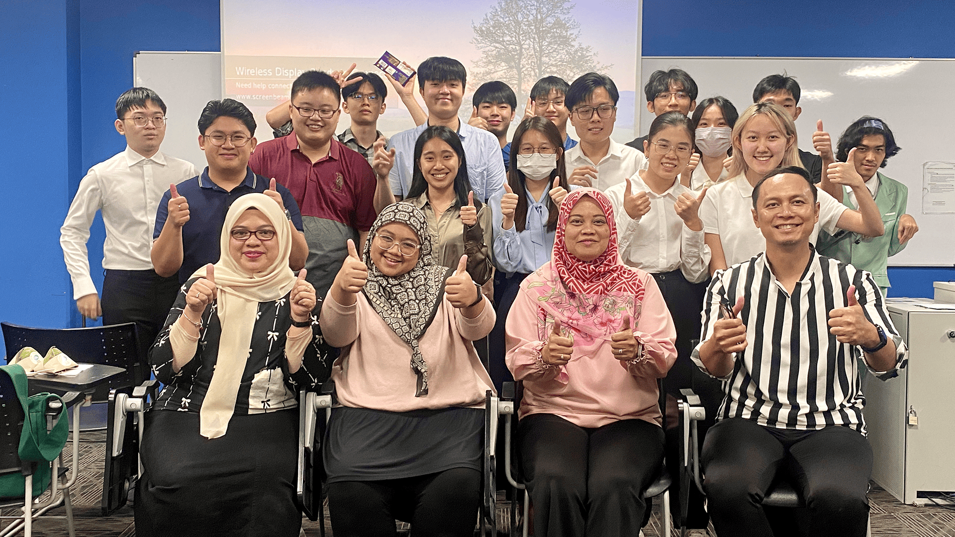Group photo of SME representatives and Associate Professor Dr Afizan Asman (front row) with Taylor’s University students (back row)