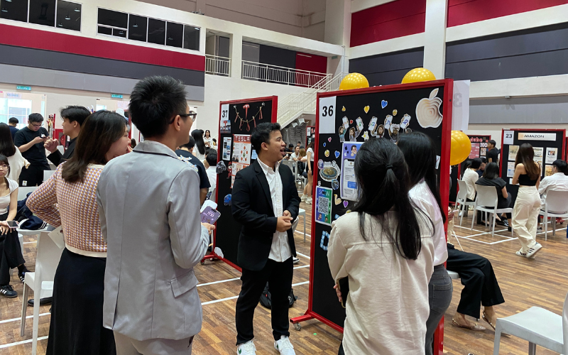 Dr Karen Tsen (Event organiser and judge) seen evaluating student presentations