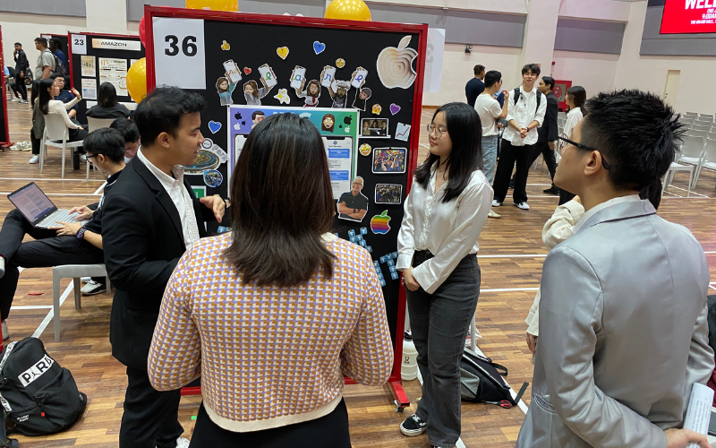 Enthusiastic students showcase their innovative findings to judges