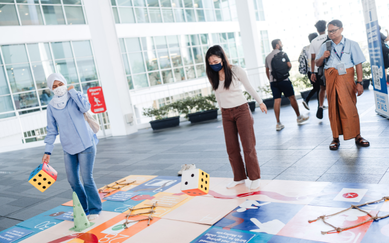 Participants were engaged in a life-sized Snakes and Ladders game that illustrated the ups and downs of Malaysian women striving for equal citizenship rights.
