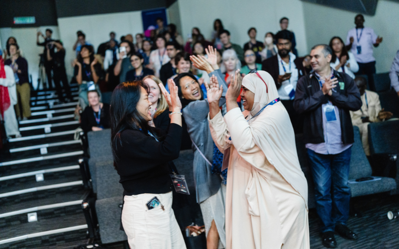 Conference participants from different cultural backgrounds experienced a moment of joy and camaraderie together during the conference.