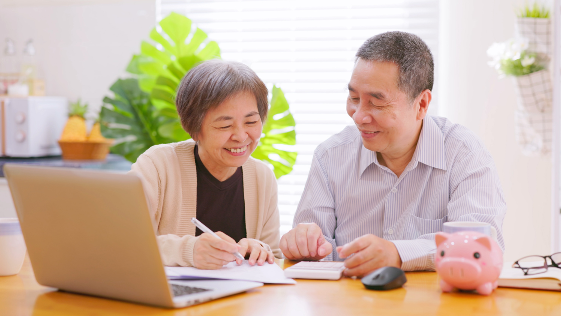 Asian elders looking at the phone