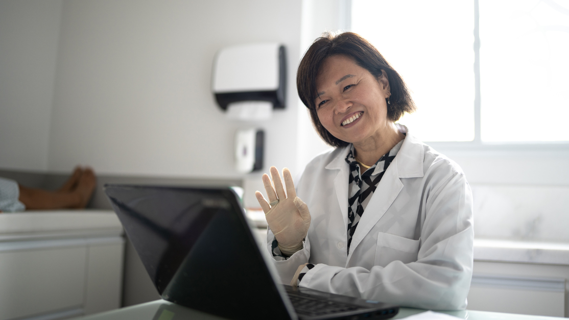 Senior female doctor having online personalisation call with patient