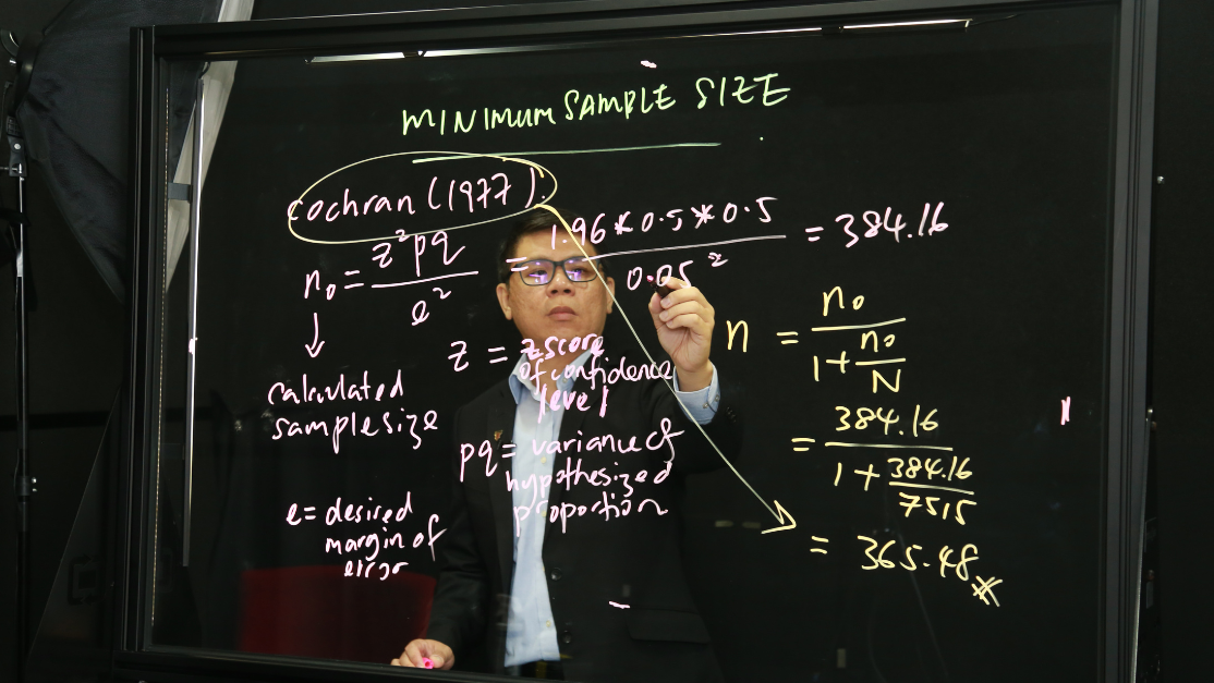 Taylor's lecturer using lightboard