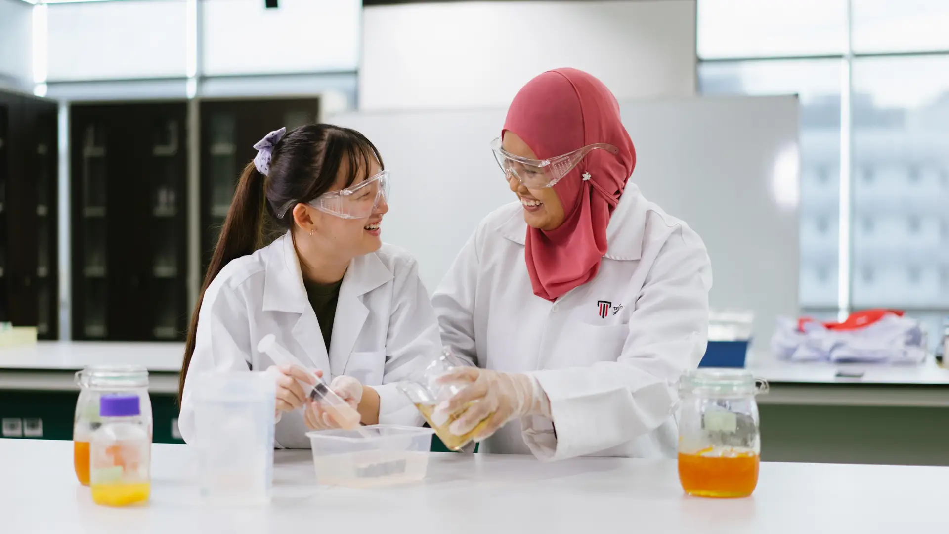 Taylor's research student in the laboratory