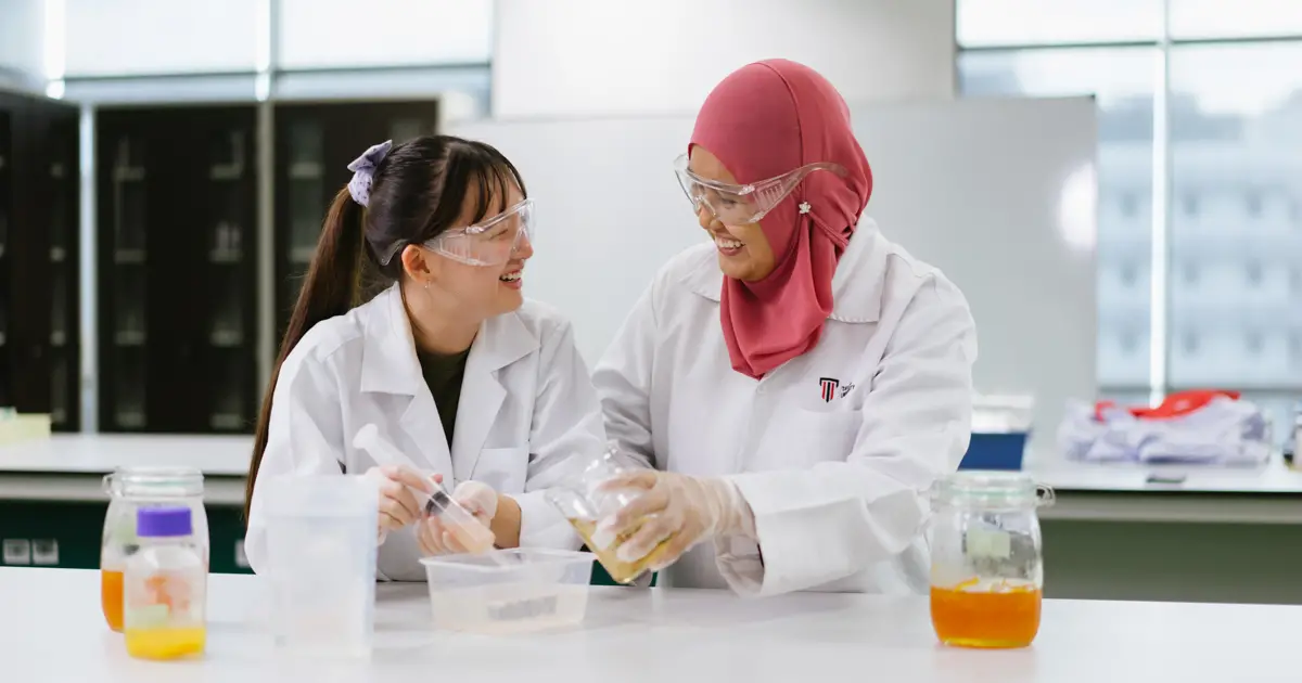 Taylor's research student in the laboratory