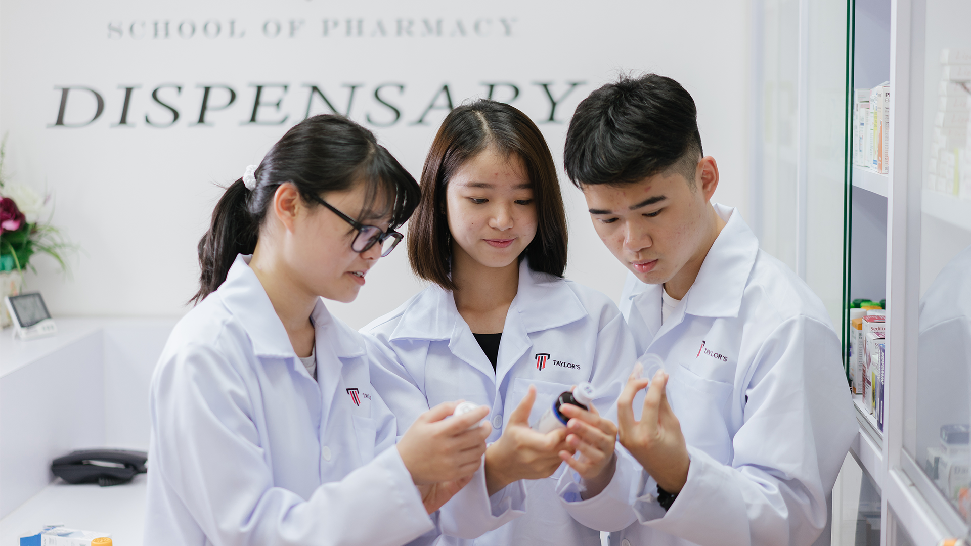 Three taylor's medical student at dispensary