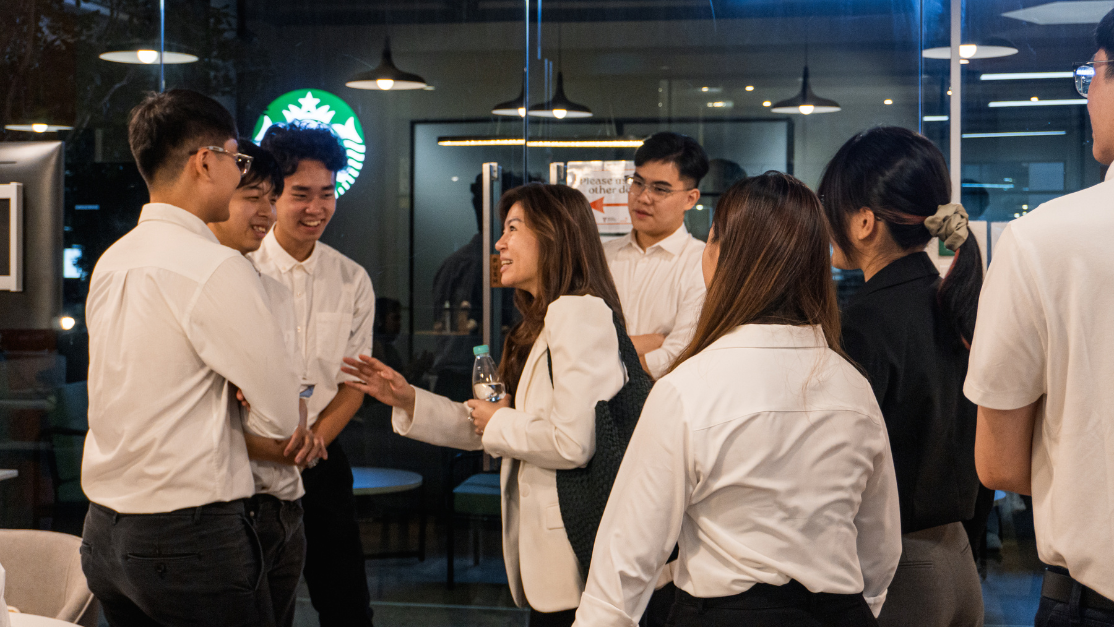 students on networking session with industry partner