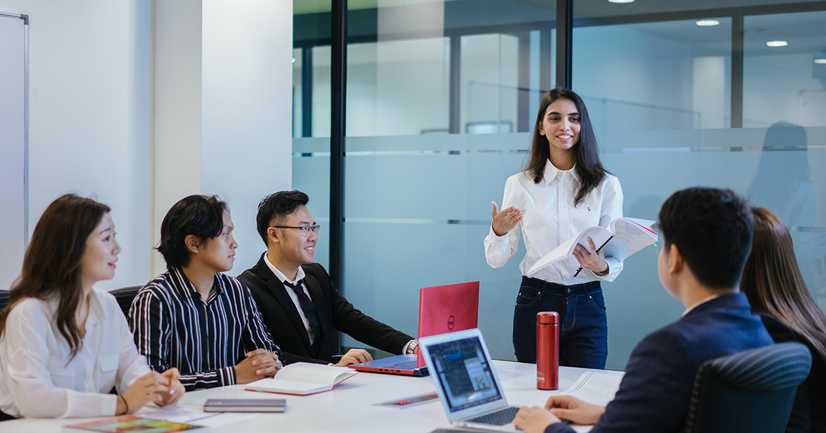 Student presenting business idea in front of peers