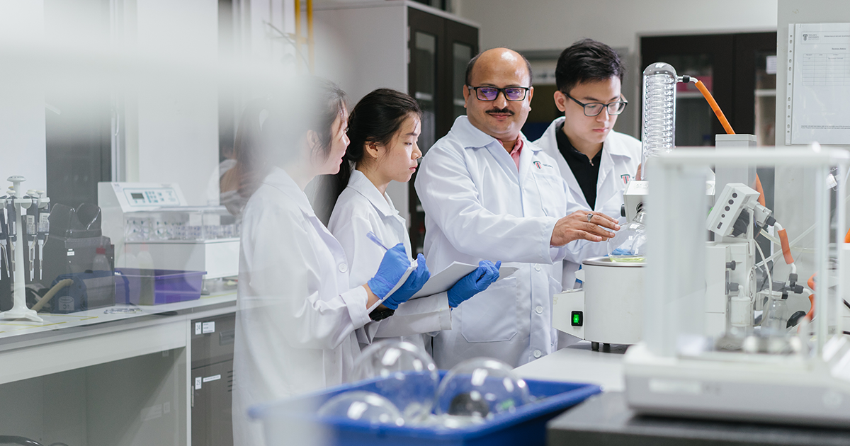Taylor's researcher and students at the labs