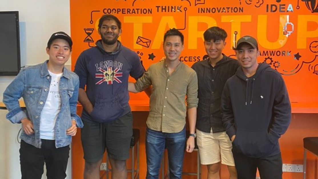 photo of students with trainer