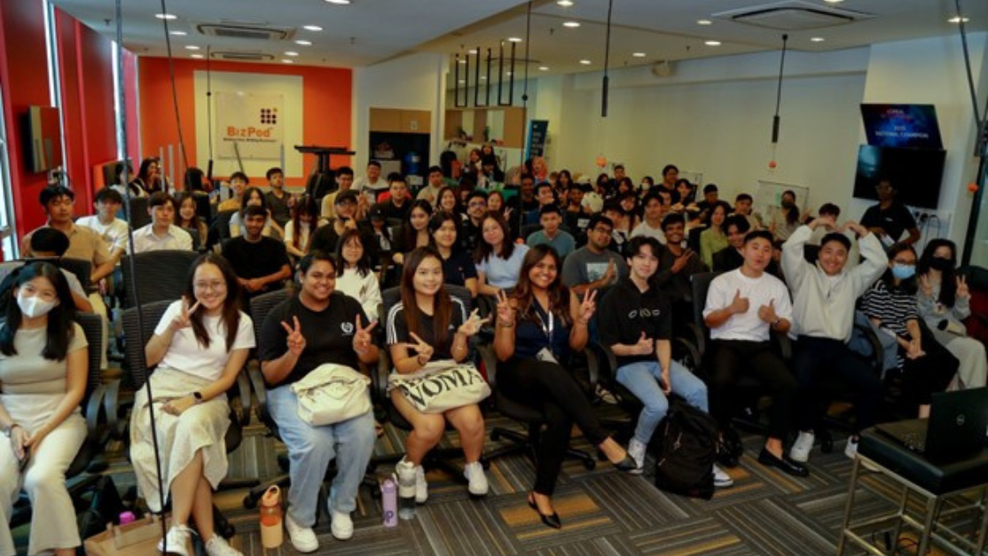 group photo of students with speaker