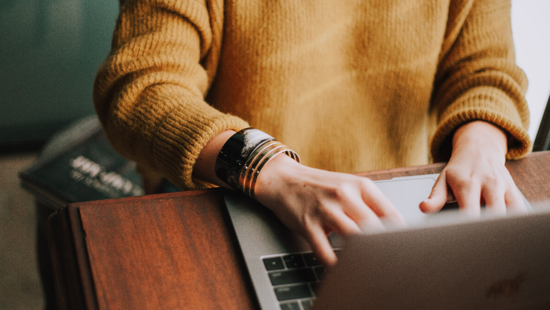an individual using a laptop