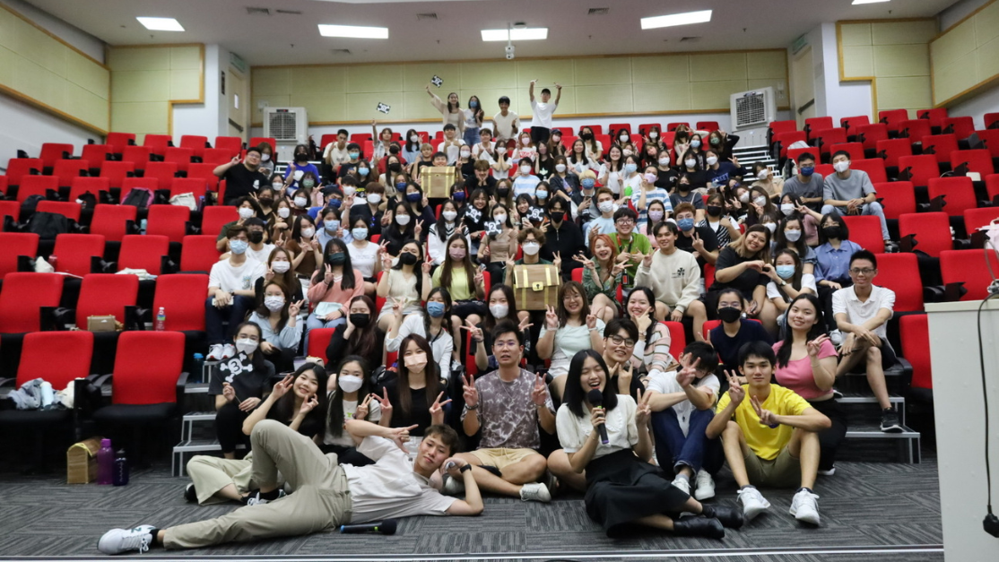 taylors chinese society students' group photo in a lecture hall