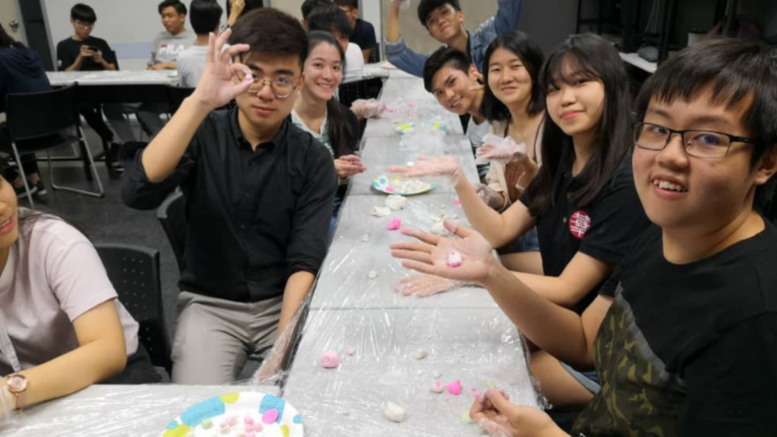 students making glutinous rice balls together