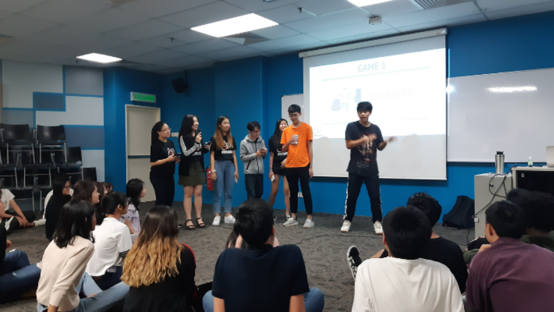 students gathering in a classroom