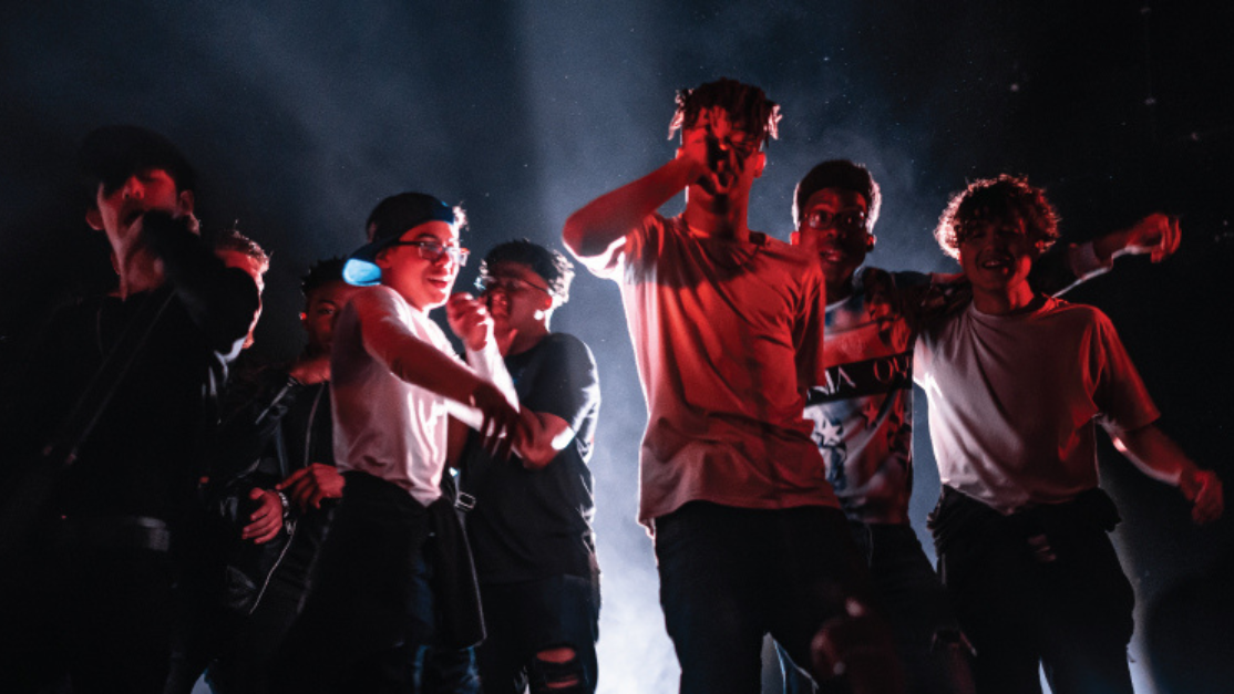 students performing passionately on stage