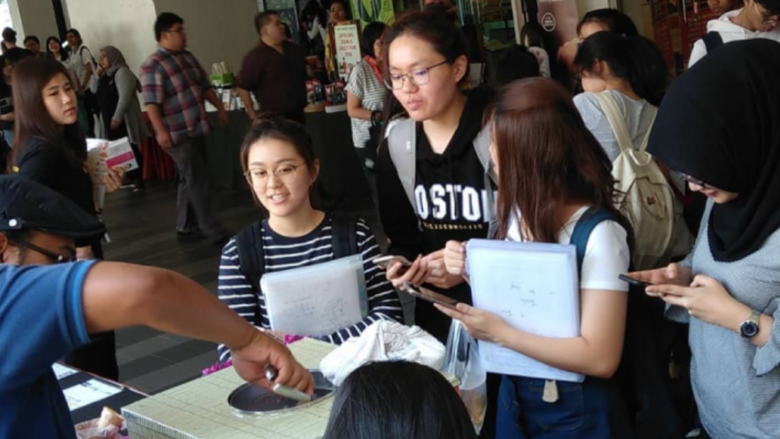students lining up for ice cream