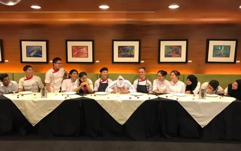 Culinary Students at a dinner table