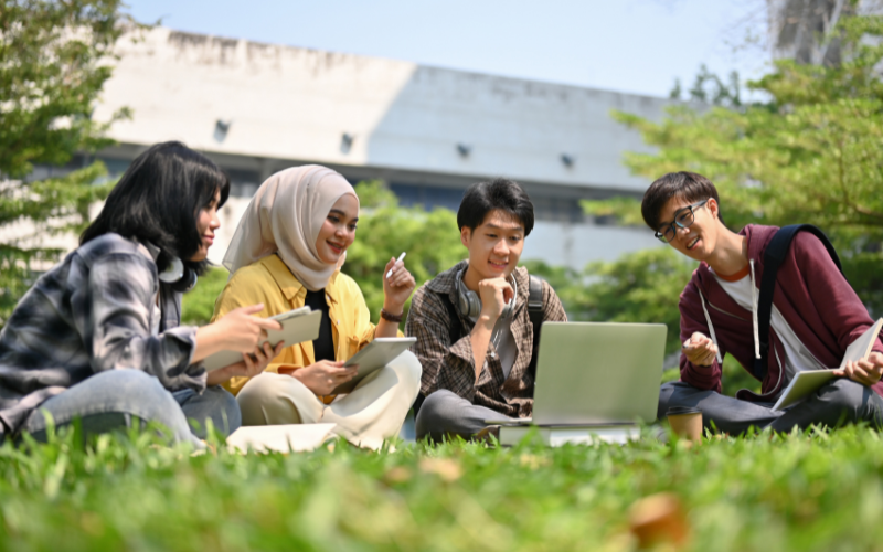 Students discussing in the park