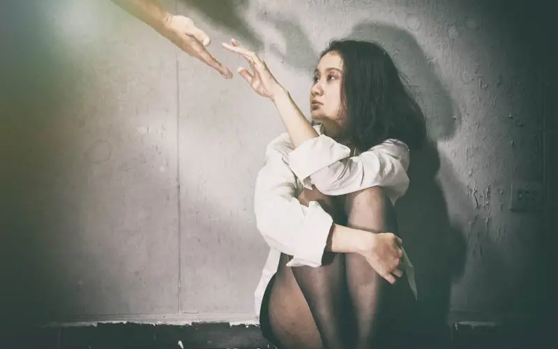 Women reaching out for help