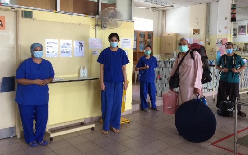 My colleague and I discharging the last two patients of COVID-19 positive patients in Penang.