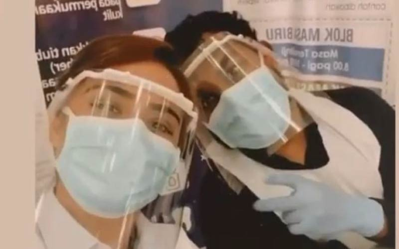 Dr Mahes Arvin with colleague