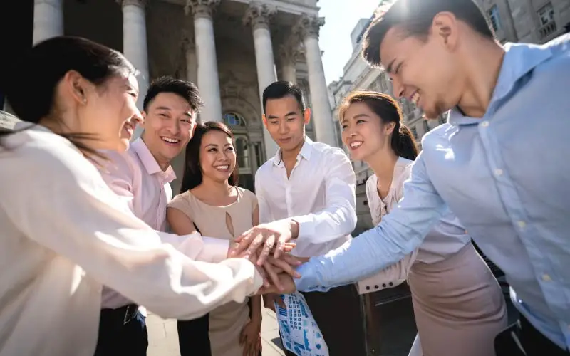 Corporate people cheering