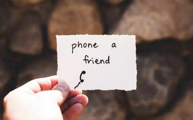 note that says "phone a friend"