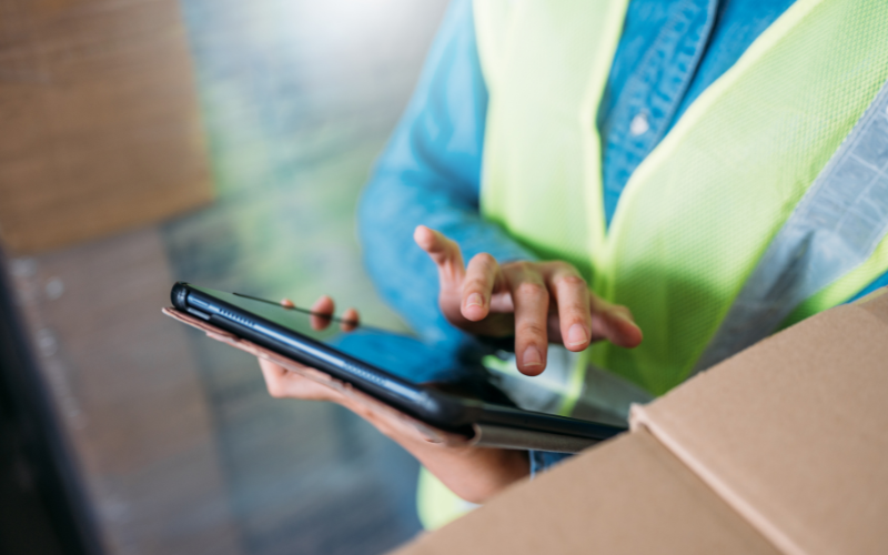 workers using a tablet for work