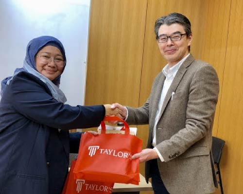 dr noor shaking hands with a man