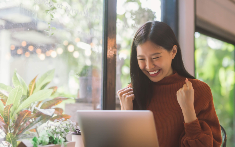 Woman looking at laptop 