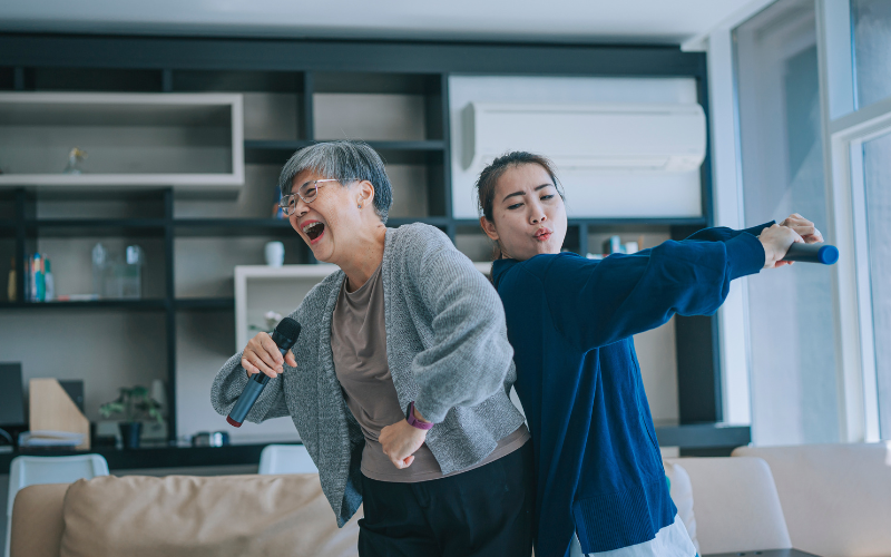 Chinese woman singing with her daughter