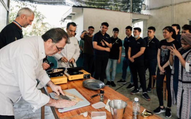 Chef Pascal teaching students