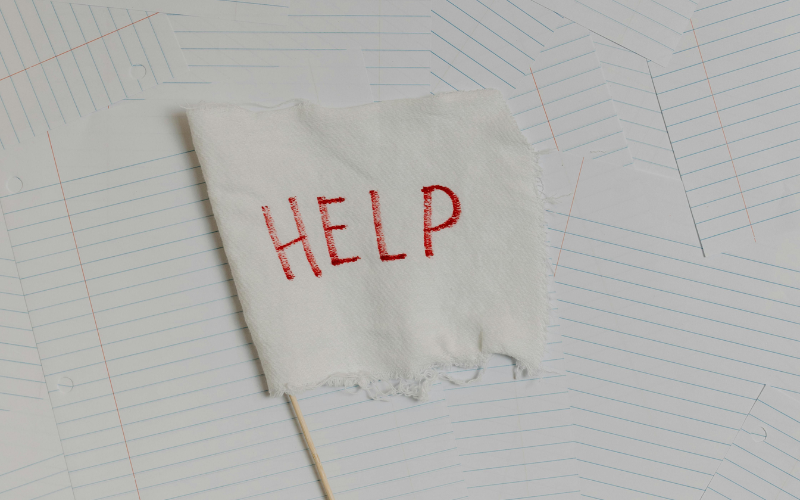 A flag with the word "HELP" on it