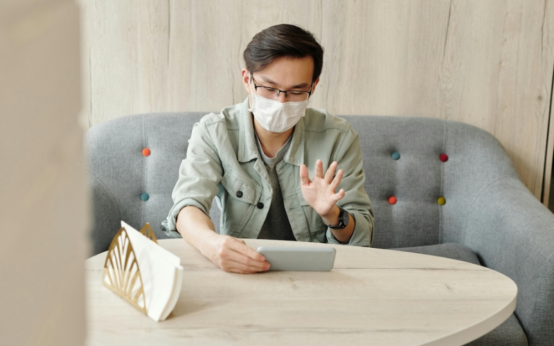 Guy having video call on a phone