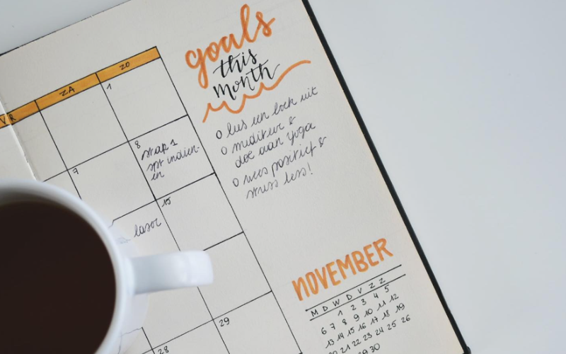 Planner and a cup of coffee