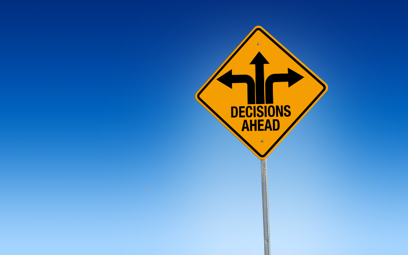 Road sign for "decisions ahead"