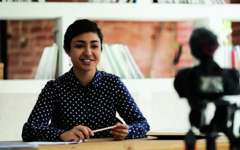girl speaking to a camera