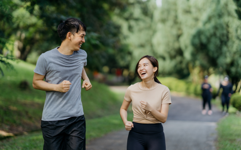 man and woman jogging